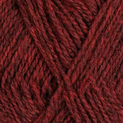 Nøgle Rauma Finull garn i farven 4131 Dæmpet Rød – 2-tråds norsk uld i afdæmpet rød tone.