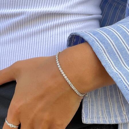 Julie wearing Tennis bracelet made in 925 pure sterling silver with white zirconia.