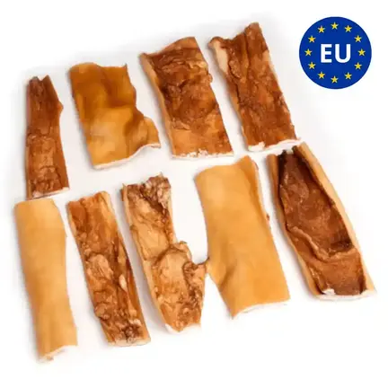 Snack’it Okse Pandebrask – naturlig tyggesnack af oksehovedhud til hunde, vist i forskellige stykker med EU-mærke