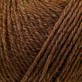 close up af garnnoegle heavy merino fra knitting for olive i farven lys cognac