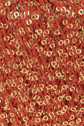 close up af garnoegle af maerket paillettes fra lang yarns i farven red and gold