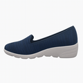 Navy blå slip-on damesko med hvid sål i strikket tekstil
