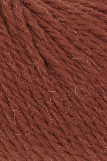 close up af garnnoegle af maerket carpe diem fra lang yarns i farven brun