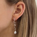 SWIRL W. PEARL silver earrings | Danish design by Mads Z