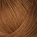 close up af garnnoegle merino fra knitting for olive i farven lys cognac