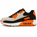 Unisex sneaker i beige, sort og orange med luftpude