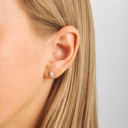 Diamond Drop earrings in 14-carat gold, as shown on the model