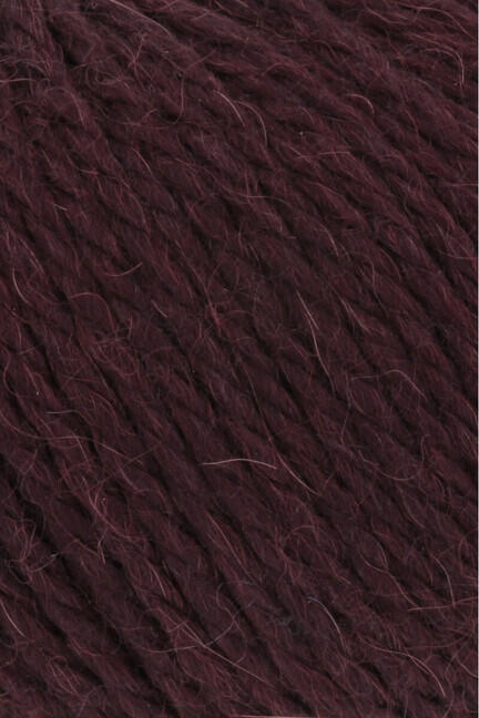 close up af garnnoegle af maerket carpe diem fra lang yarns i farven bordeaux