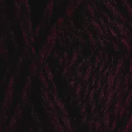 Close up af garnnøgle Vams fra Rauma i farven mørk burgunder 116