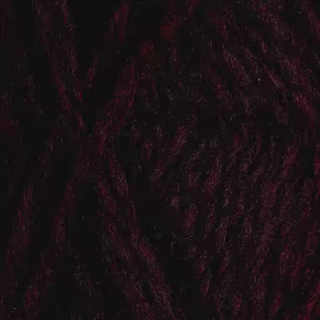 Close up af garnnøgle Vams fra Rauma i farven mørk burgunder 116