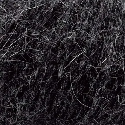 Close up af garnnoegle i angora fra mondial i farven mørkegrå 659