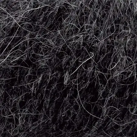 Close up af garnnoegle i angora fra mondial i farven mørkegrå 659