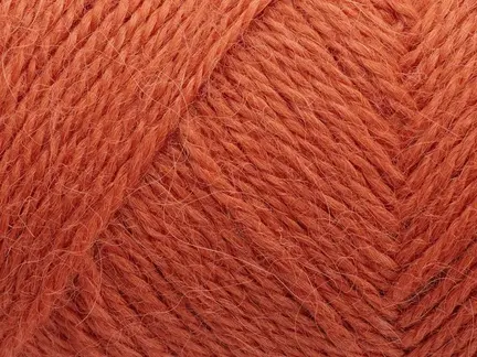close up af garnnoegle af maerket vilja fra filcolana farve autumn orange