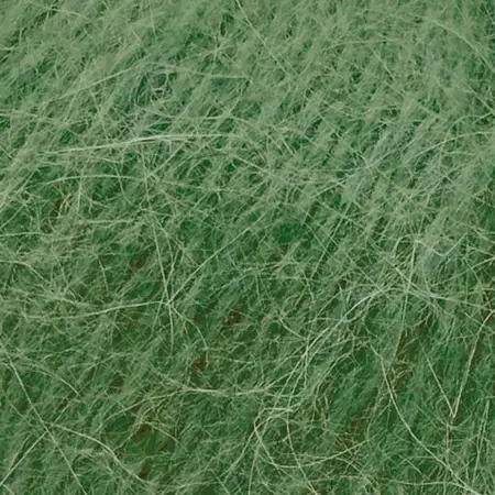 Close up af garnnoegle i angora fra mondial i farven grøn 727