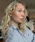 Ida wearing Starfish Lustre earrings made in 925 pure sterling silver plated with a durable 18 carat gold plating.