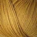 close up af garnnoegle merino fra knitting for olive i farven stoevet honning