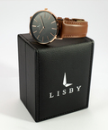Lisby Origin ur med brun læderrem oven på Lisby ur boks