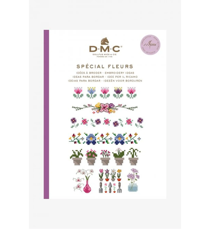 forside paa bog fra dmc med broderimoenstre temaet blomster med mange broderede blomster