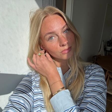 Nathalie wearing Aurelia bracelet made in 925 sterling silver plated with 18 karat gold.