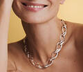 Model wearing WINELINK silver necklace.