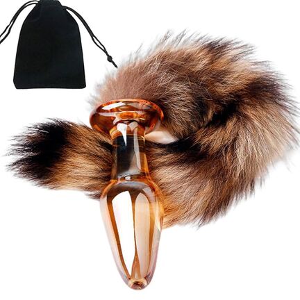 Gennemsigtig akryl buttplug med brun/sort rævehale, 11 cm lang og 2,5 cm i diameter.